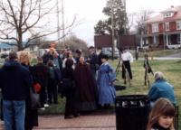 Federal and civilian reenactors mingle with townsfolk before the event
